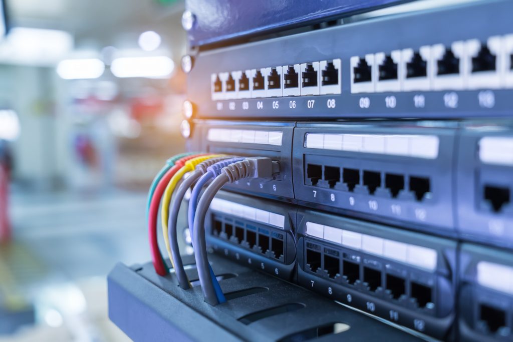 network cables and hub closeup Security Camera systems - Falcon Security